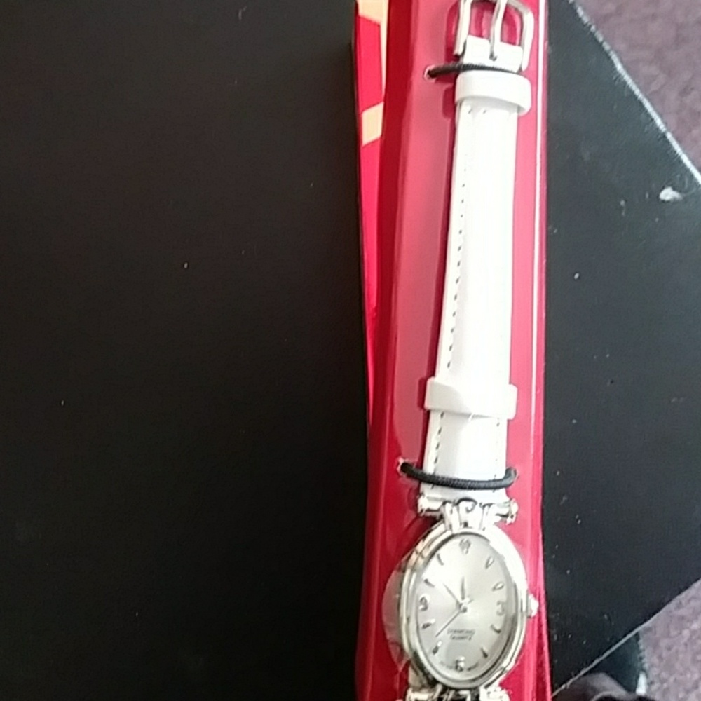 Genuine diamond accent Strap watch silver